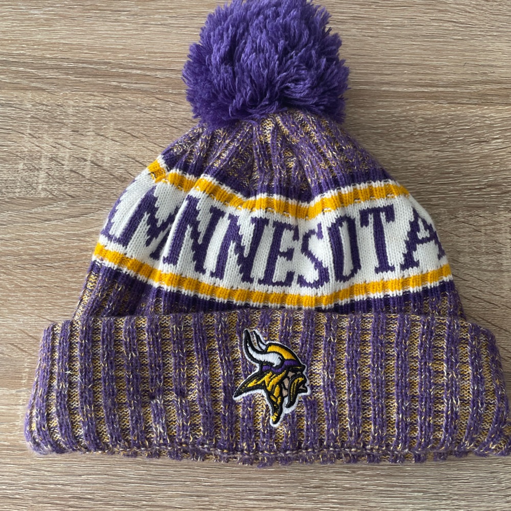 2020 Minnesota Vikings team wear stocking hat.